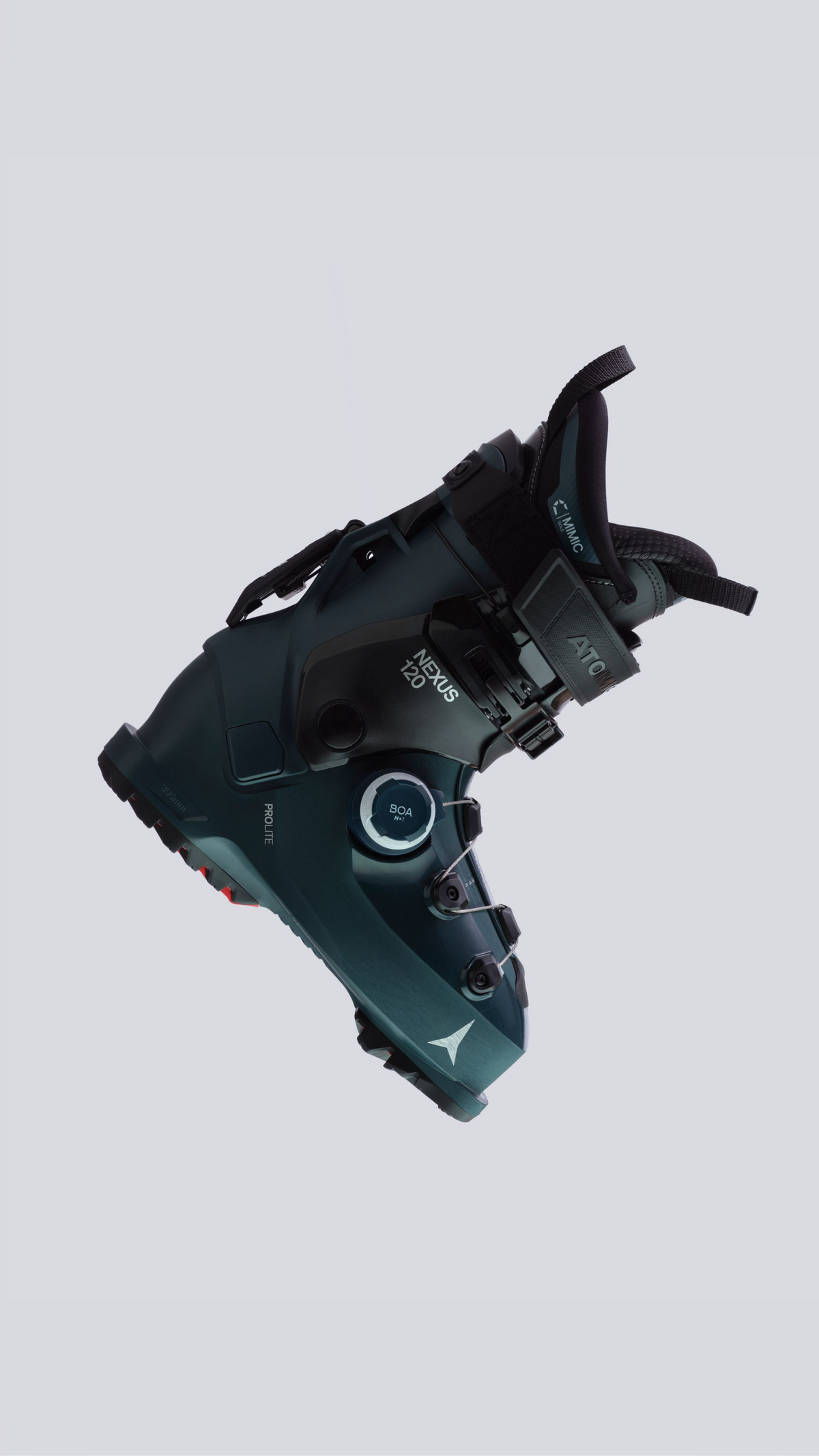 A single ski boot floating against a light gray background, shown at an angle to display its side and front features. The boot is dark teal with black buckles and straps, featuring white branding text including 'Mizuno' and 'ATX'.